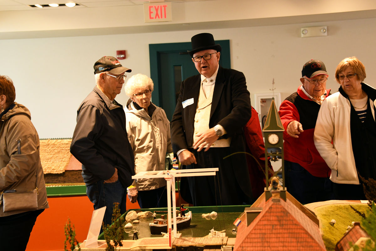 177 Arvid and Darlene Janzen chat with a Pella volunteer.JPG